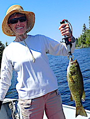 Ollie with 1 Of 4 Trophy Smallmouth Bass Fishing at Fireside Lodge in Canada